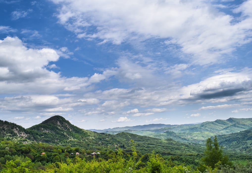Panorama of hills under a cloudy sky at Scăieni, Buzău Land